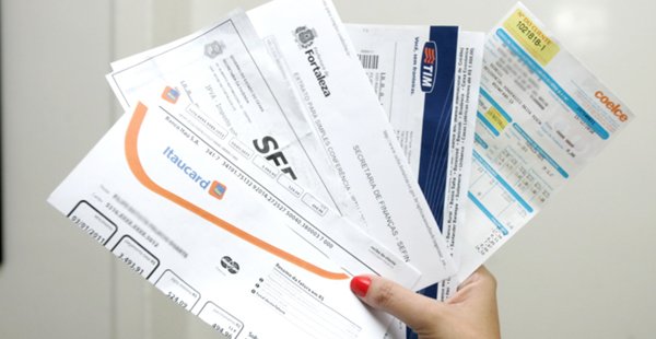 IBGE: Famílias brasileiras deixaram de comprar para pagar dívidas com tributos